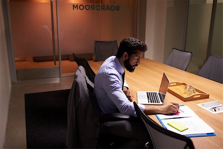 simsearch:400-08111295,k - Hispanic businessman working late in office, elevated view Stock Photo - Budget Royalty-Free & Subscription, Code: 400-08838916