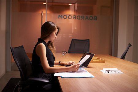 simsearch:400-08838779,k - Young Asian businesswoman working alone late in an office Stock Photo - Budget Royalty-Free & Subscription, Code: 400-08838939