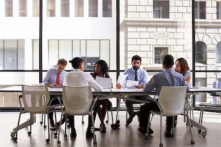 simsearch:400-08838924,k - Corporate business team meeting in a modern open plan office Stock Photo - Budget Royalty-Free & Subscription, Code: 400-08838971
