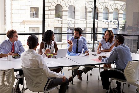 simsearch:400-08838985,k - Corporate business team and manager in a meeting, close up Stock Photo - Budget Royalty-Free & Subscription, Code: 400-08838973