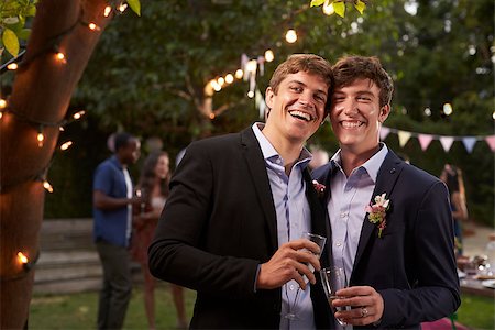 pacific islander at home - Gay Couple Celebrating Wedding With Party In Backyard Stock Photo - Budget Royalty-Free & Subscription, Code: 400-08839123