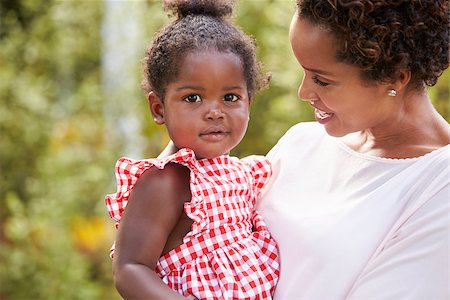 simsearch:400-04045907,k - Portrait of African American mother holding baby daughter Stock Photo - Budget Royalty-Free & Subscription, Code: 400-08839184