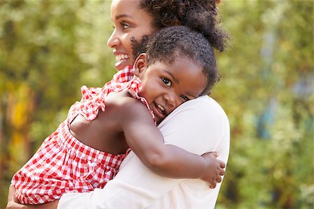 simsearch:400-04045907,k - African American mother embracing with baby daughter Stock Photo - Budget Royalty-Free & Subscription, Code: 400-08839186