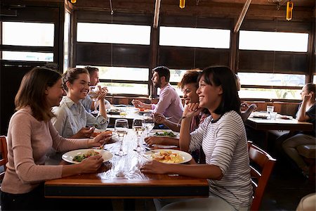 simsearch:400-08937692,k - Four female friends at a girlsÕ lunch in a busy restaurant Stock Photo - Budget Royalty-Free & Subscription, Code: 400-08839287