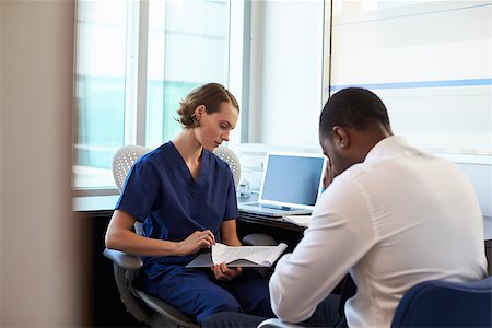 Doctor In Consultation With Depressed Male Patient Stock Photo - Budget Royalty-Free & Subscription, Code: 400-08839409