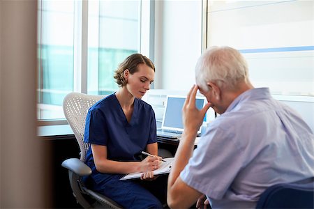 Doctor In Consultation With Depressed Male Patient Stock Photo - Budget Royalty-Free & Subscription, Code: 400-08839413