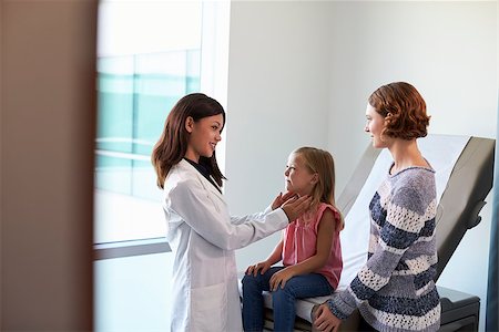 simsearch:400-04021788,k - Pediatrician Meeting With Mother And Child In Exam Room Stock Photo - Budget Royalty-Free & Subscription, Code: 400-08839474