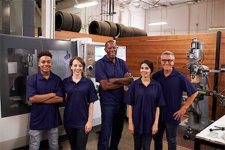 Portrait Of Engineers And Apprentices With CNC Machine Stock Photo - Budget Royalty-Free & Subscription, Code: 400-08839534