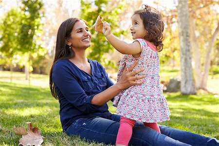 simsearch:400-05676627,k - Asian Caucasian mixed race mother and young daughter in park Stock Photo - Budget Royalty-Free & Subscription, Code: 400-08839610