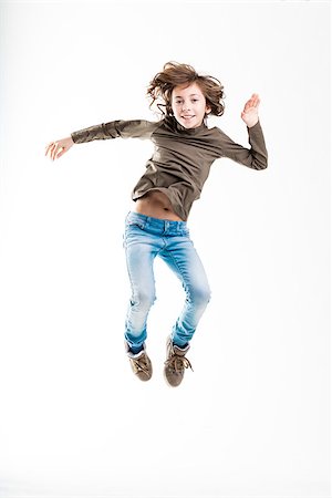 simsearch:400-08831347,k - girl caught as she was flying in the middle of a jump Stock Photo - Budget Royalty-Free & Subscription, Code: 400-08831345