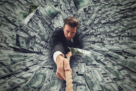 Businessman swallowed by black hole of money Stock Photo - Budget Royalty-Free & Subscription, Code: 400-08832327