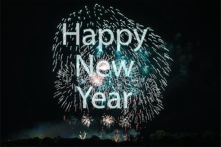 simsearch:400-06736432,k - Happy New Year with colorful sparklers. The words Happy New Year are integrated into the fireworks on black background Foto de stock - Royalty-Free Super Valor e Assinatura, Número: 400-08833026