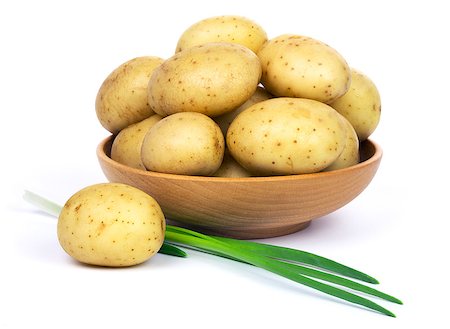 simsearch:400-04292292,k - Raw unpeeled potatoes in a wooden bowl and green onions, isolated on white background. Fotografie stock - Microstock e Abbonamento, Codice: 400-08833673