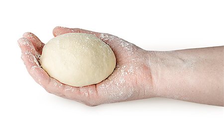 Piece of dough in human hand isolated on white background Photographie de stock - Aubaine LD & Abonnement, Code: 400-08864730