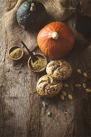 simsearch:400-06429990,k - Healthy eating. Pumpkins with pumpkin flour and bread. Pumpkin oil on wood Stock Photo - Budget Royalty-Free & Subscription, Code: 400-08861257