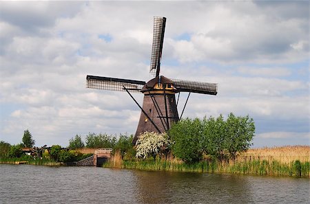 simsearch:400-05339966,k - One of the 19 iconic windmills survived at Kinderdijk, The Netherlands. Stock Photo - Budget Royalty-Free & Subscription, Code: 400-08861711