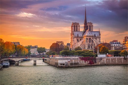 simsearch:862-06825493,k - Cityscape image of Paris, France with the Notre Dame Cathedral during sunset. Foto de stock - Super Valor sin royalties y Suscripción, Código: 400-08861836