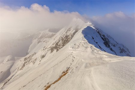 simsearch:400-07309307,k - The Moldoveanu Peak in winter. Fagaras Mountains, Romania Stockbilder - Microstock & Abonnement, Bildnummer: 400-08862043