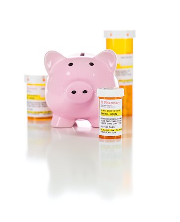 simsearch:400-08862116,k - Piggy Bank and Non-Proprietary Medicine Prescription Bottles Isolated on a White Background. Stock Photo - Budget Royalty-Free & Subscription, Code: 400-08862125