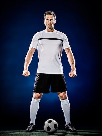 simsearch:400-08863143,k - one caucasian soccer player man isolated on black background Stock Photo - Budget Royalty-Free & Subscription, Code: 400-08862375