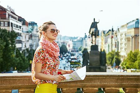 simsearch:400-08530001,k - The spirit of old Europe in Prague. smiling young woman on Vaclavske namesti in Prague, Czech Republic sightseeing Stockbilder - Microstock & Abonnement, Bildnummer: 400-08862678