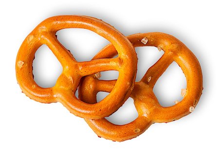 simsearch:400-08862169,k - Two crunchy pretzels with salt on each other isolated on white background Stockbilder - Microstock & Abonnement, Bildnummer: 400-08862888