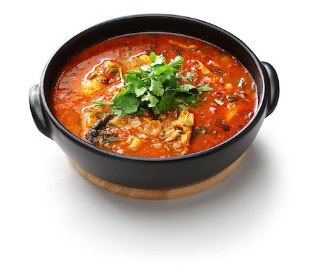 moqueca capixaba, brazilian fish stew isolated on white background Fotografie stock - Microstock e Abbonamento, Codice: 400-08863460