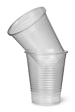 simsearch:400-06072755,k - Two plastic cups each other isolated on white background Foto de stock - Super Valor sin royalties y Suscripción, Código: 400-08863496