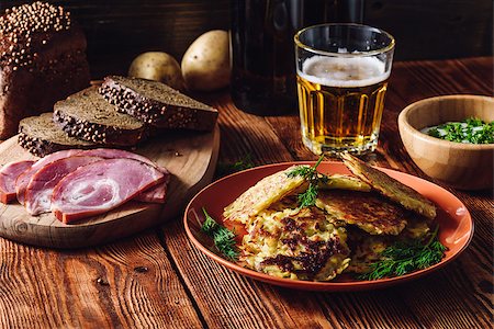 Traditional Potato Pancakes with Glass of Beer Stock Photo - Budget Royalty-Free & Subscription, Code: 400-08863603