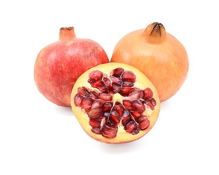 simsearch:640-02656973,k - Two whole pomegranates and a cut half showing seeds, isolated on a white background Fotografie stock - Microstock e Abbonamento, Codice: 400-08863995