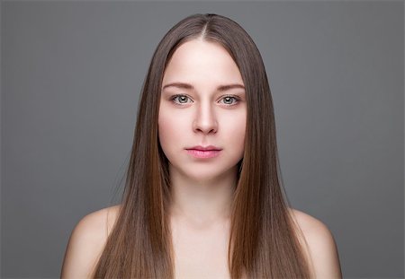 simsearch:400-06179308,k - Beautiful young brunette with long straight hair Stock Photo - Budget Royalty-Free & Subscription, Code: 400-08887816