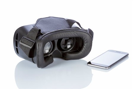 simsearch:400-08621230,k - VR Glasses and smartphone with clipping path for screen isolated on white background. Foto de stock - Super Valor sin royalties y Suscripción, Código: 400-08887924