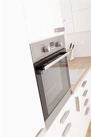 simsearch:400-06694997,k - Modern stainless oven in modern white new kitchen. Interior kitchen design. Stock Photo - Budget Royalty-Free & Subscription, Code: 400-08888165