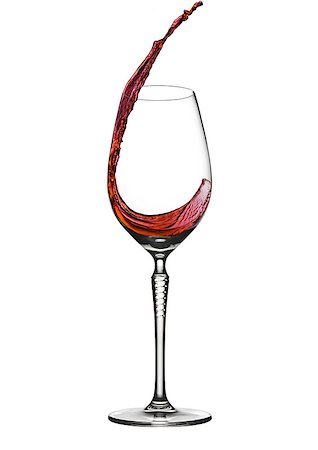 simsearch:400-05676396,k - Pouring wine to elegant wine glass with splash on white background Stock Photo - Budget Royalty-Free & Subscription, Code: 400-08888498
