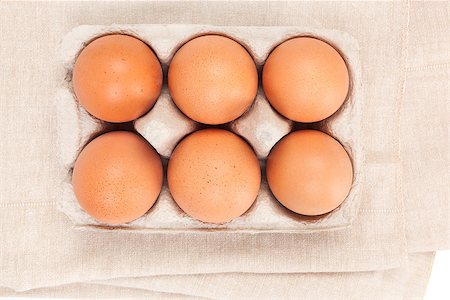 simsearch:400-04313912,k - Natural organic chicken eggs in cardboard package, top view. Stockbilder - Microstock & Abonnement, Bildnummer: 400-08888705