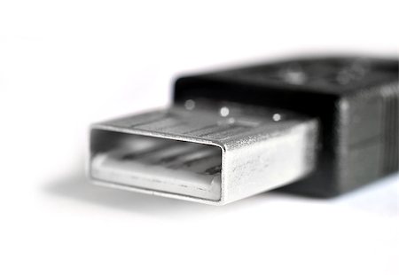 studio023 (artist) - USB connector type A closeup on a white background Stockbilder - Microstock & Abonnement, Bildnummer: 400-08888898