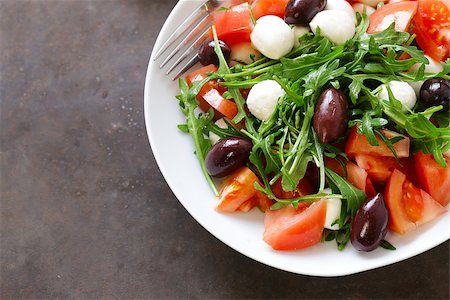 simsearch:400-08071423,k - mozzarella salad with tomatoes and green arugula Foto de stock - Royalty-Free Super Valor e Assinatura, Número: 400-08888911