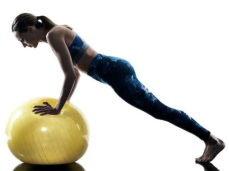simsearch:400-05112689,k - one caucasian woman exercising fitness swiss ball excercises in silhouette isolated on white background Foto de stock - Super Valor sin royalties y Suscripción, Código: 400-08889006