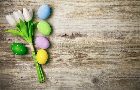 simsearch:6102-03750354,k - Easter eggs with bunch tulips copyspace on wooden board Photographie de stock - Aubaine LD & Abonnement, Code: 400-08889769