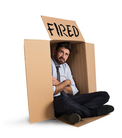 simsearch:400-08551867,k - Desperate and fired businessman hides in the cardboard Stock Photo - Budget Royalty-Free & Subscription, Code: 400-08898618