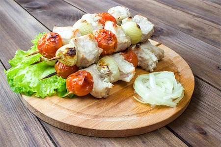 simsearch:400-08918324,k - Skewered on wooden sticks tasty pork meat and vegetables mix, on wooden background Stock Photo - Budget Royalty-Free & Subscription, Code: 400-08890879