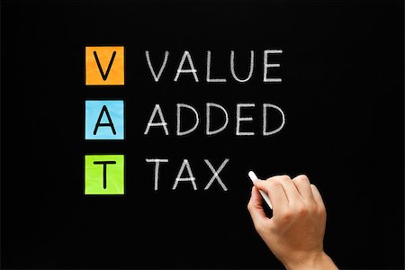 simsearch:400-05339747,k - Hand writing VAT - Value Added Tax with white chalk on blackboard. Stock Photo - Budget Royalty-Free & Subscription, Code: 400-08890972