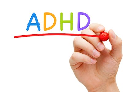 Hand writing ADHD Attention Deficit Hyperactivity Disorder with marker on transparent glass board. Foto de stock - Super Valor sin royalties y Suscripción, Código: 400-08891180