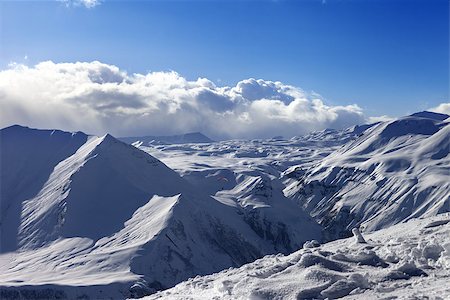 simsearch:400-05157183,k - Speed flying in sunny winter mountains. Caucasus Mountains. Georgia, region Gudauri. Photographie de stock - Aubaine LD & Abonnement, Code: 400-08891365