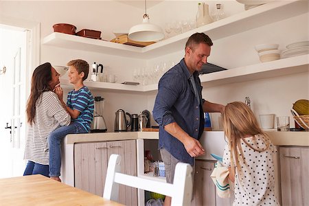 pictures of kids helping parents with dishes - Children Helping Parents In Kitchen With Chores Stock Photo - Budget Royalty-Free & Subscription, Code: 400-08891815