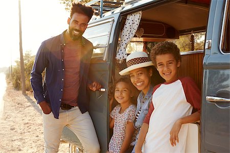 Young family make a stop on a road trip in their camper van Stock Photo - Budget Royalty-Free & Subscription, Code: 400-08891977