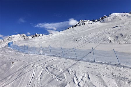 simsearch:400-08780271,k - Ski track in sun winter day. Caucasus Mountains, Tetnuldi, Svaneti region of Georgia. Photographie de stock - Aubaine LD & Abonnement, Code: 400-08892773
