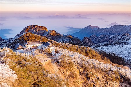 simsearch:400-09070594,k - Winter sunrise landscape in Huangshan National park. Park located in Anhui province in China. It is a UNESCO World Heritage Site. Stock Photo - Budget Royalty-Free & Subscription, Code: 400-08892799