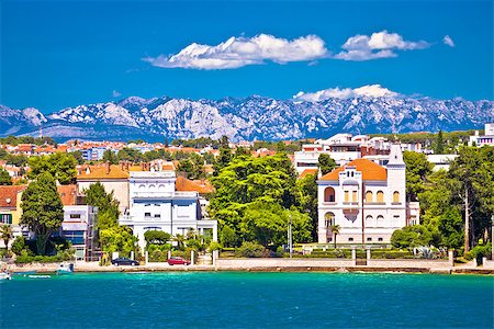 detail of boat and people - Zadar coast villas ann Velebit mountain background, Dalmatia, Croatia Stock Photo - Budget Royalty-Free & Subscription, Code: 400-08892942