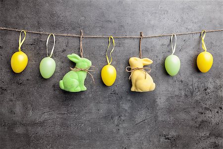 simsearch:400-07921731,k - Traditional Easter eggs and bunnies on hanging on rustic background Stock Photo - Budget Royalty-Free & Subscription, Code: 400-08893232